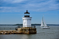 Sailboat Passes Portland Breakwater Lighthouse in Maine